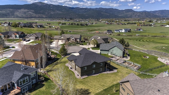 bird's eye view featuring a residential view and a mountain view