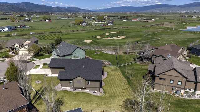 2626 Muirfield Ct, Missoula, MT 59808 - aerial view of property's location with nearby suburban area, a golf course, and a water and mountain view