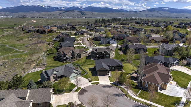 bird's eye view featuring a residential view and a mountain view