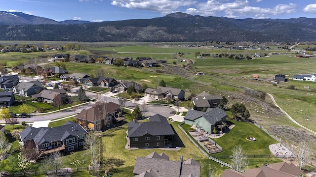 bird's eye view with a residential view and a mountain view