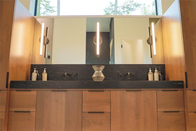 bathroom featuring double vanity