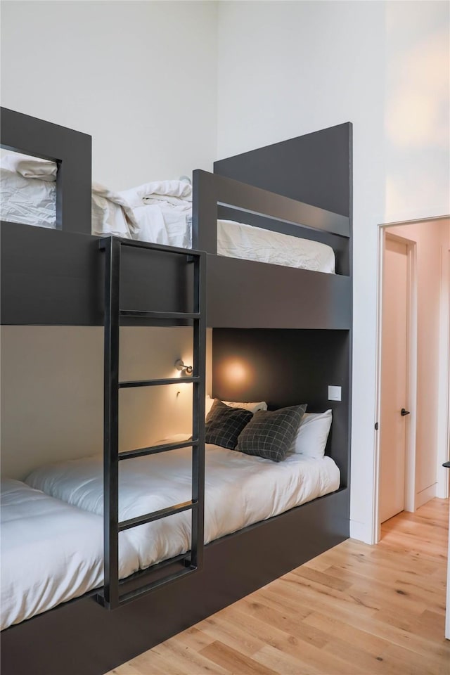 bedroom with wood finished floors