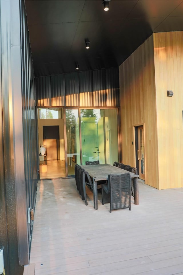 view of patio / terrace featuring outdoor dining space and a deck