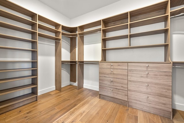 walk in closet featuring light wood-type flooring