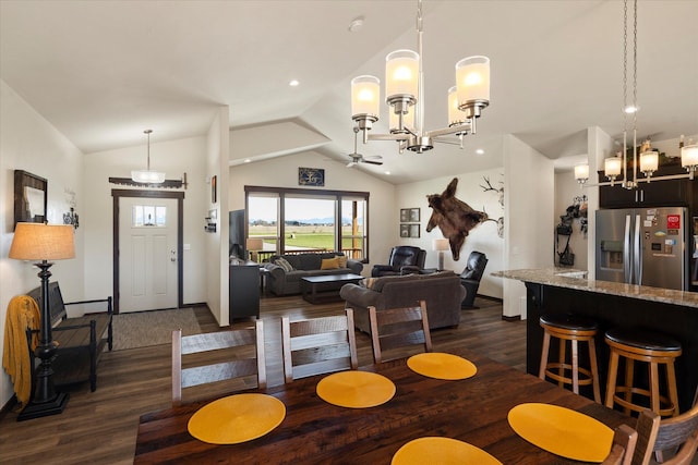 dining area with dark wood-style flooring, baseboards, vaulted ceiling, and ceiling fan with notable chandelier
