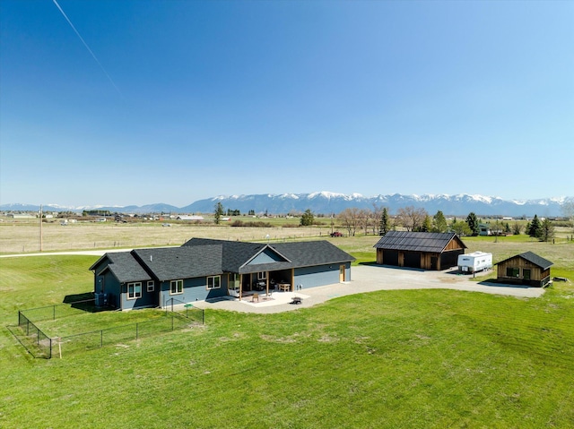 drone / aerial view with a rural view and a mountain view