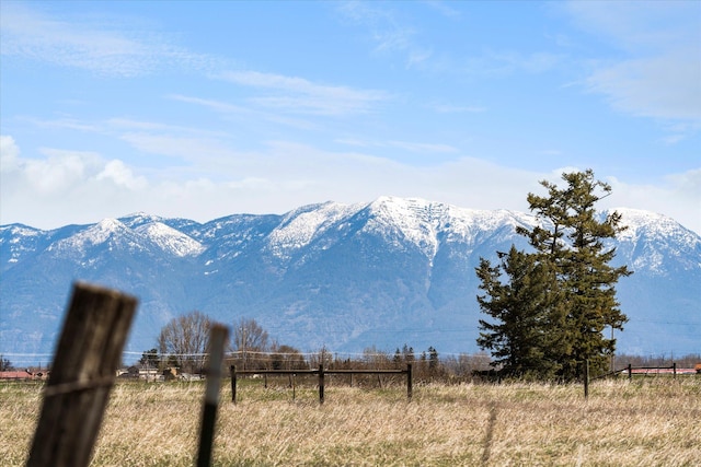 mountain view featuring a rural view