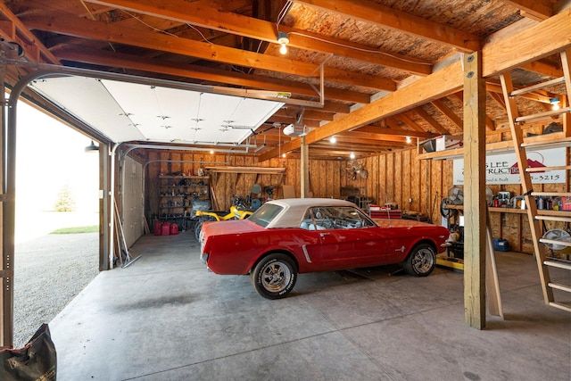garage featuring a garage door opener