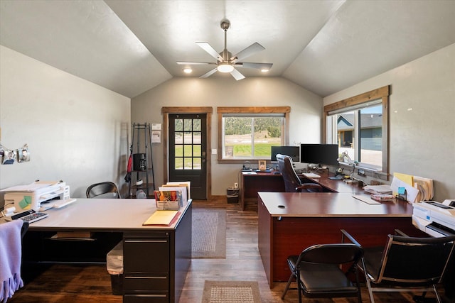 office space with ceiling fan, vaulted ceiling, dark wood-style floors, and a healthy amount of sunlight