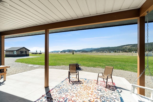 view of patio with a mountain view