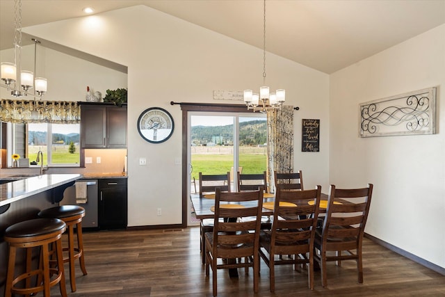 dining space with an inviting chandelier, baseboards, dark wood-style flooring, and high vaulted ceiling