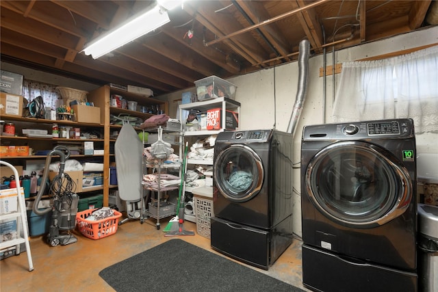 laundry room featuring washer and clothes dryer