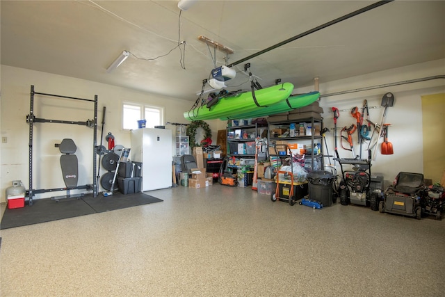garage featuring a garage door opener