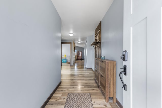 1521 Cheery Dr, Belgrade, MT 59714 - hall featuring baseboards and light wood finished floors