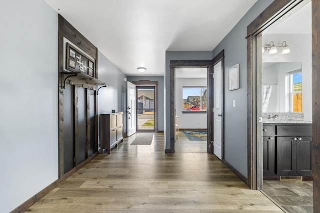1521 Cheery Dr, Belgrade, MT 59714 - corridor with visible vents and light wood finished floors