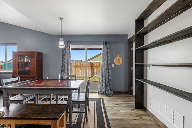 1521 Cheery Dr, Belgrade, MT 59714 - dining space with visible vents and wood finished floors