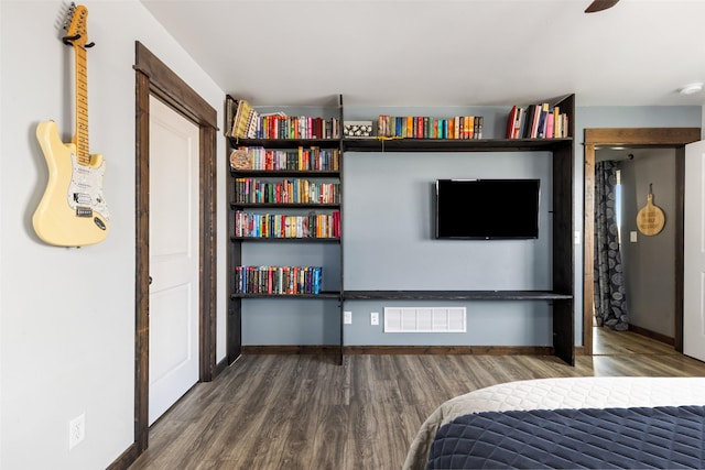 1521 Cheery Dr, Belgrade, MT 59714 - bedroom featuring baseboards, visible vents, and wood finished floors