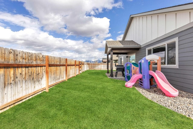 1521 Cheery Dr, Belgrade, MT 59714 - view of yard featuring a fenced backyard and a playground