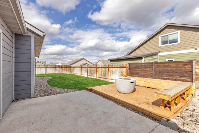 1521 Cheery Dr, Belgrade, MT 59714 - view of patio / terrace featuring a fenced backyard and a wooden deck