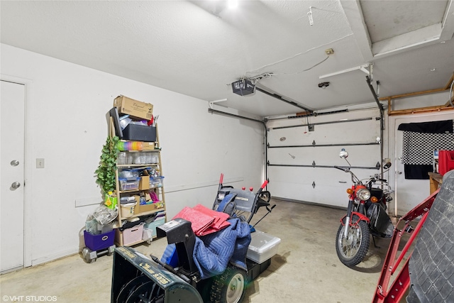 garage featuring a garage door opener
