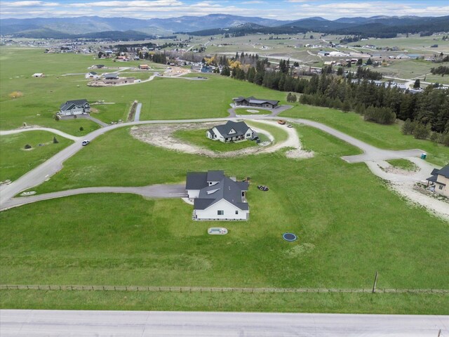 drone / aerial view featuring a mountain view