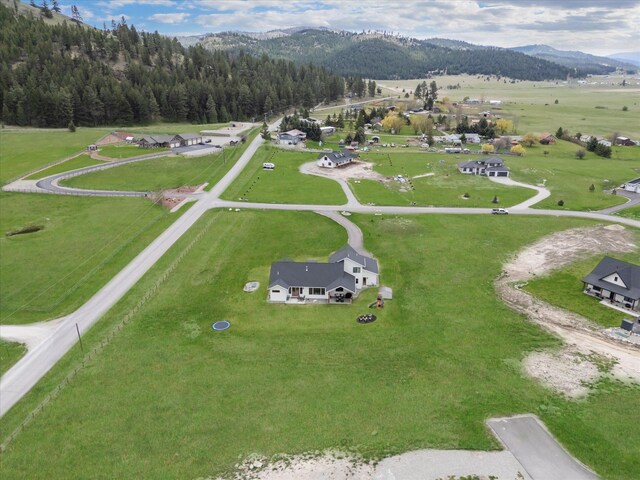 drone / aerial view featuring a mountain view