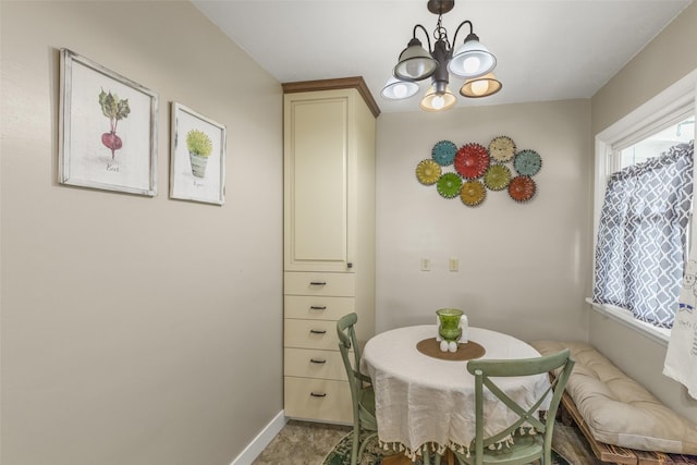 2908 6th Ave S, Great Falls, MT 59405 - dining area featuring baseboards and a notable chandelier