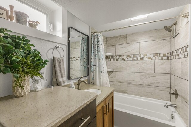 2908 6th Ave S, Great Falls, MT 59405 - bathroom featuring shower / bath combo with shower curtain and vanity
