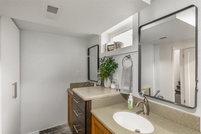 2908 6th Ave S, Great Falls, MT 59405 - bathroom with visible vents and vanity