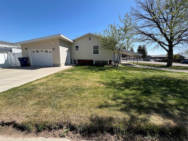 view of front of property with fence, driveway, and a front lawn