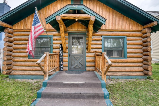 308 S 4th St, Hamilton, MT 59840 - property entrance featuring log siding and a chimney