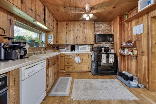 308 S 4th St, Hamilton, MT 59840 - kitchen featuring ceiling fan, a sink, light countertops, wooden ceiling, and black appliances