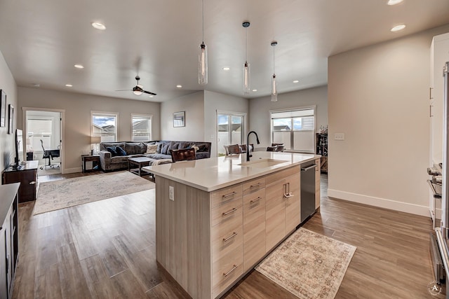 2800 Ashley Ave, East Helena, MT 59635 - kitchen with stainless steel dishwasher, modern cabinets, an island with sink, recessed lighting, and a sink