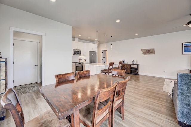 2800 Ashley Ave, East Helena, MT 59635 - dining space featuring recessed lighting, baseboards, ceiling fan, and light wood-type flooring