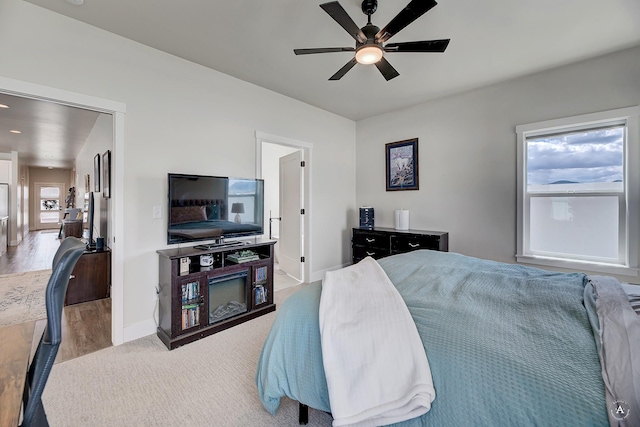 2800 Ashley Ave, East Helena, MT 59635 - bedroom featuring baseboards, ceiling fan, and wood finished floors