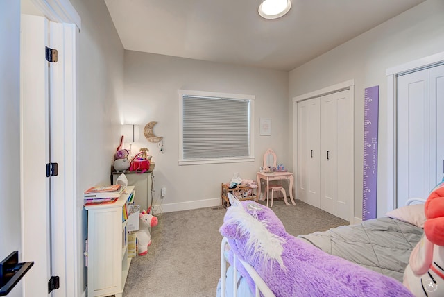 2800 Ashley Ave, East Helena, MT 59635 - bedroom featuring carpet floors, multiple closets, and baseboards