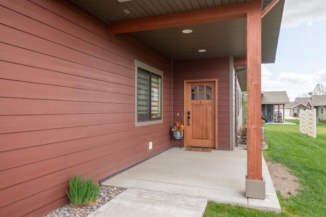4037 Valley View Ct Unit B, Missoula, MT 59808 - doorway to property featuring a lawn and a porch