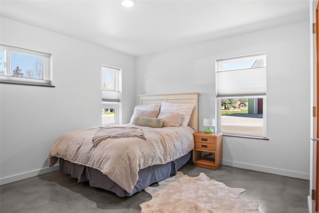 bedroom featuring baseboards, carpet flooring, and recessed lighting