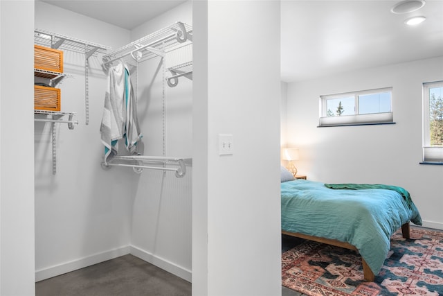 bedroom featuring baseboards