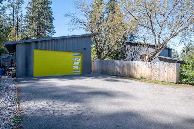 detached garage with fence