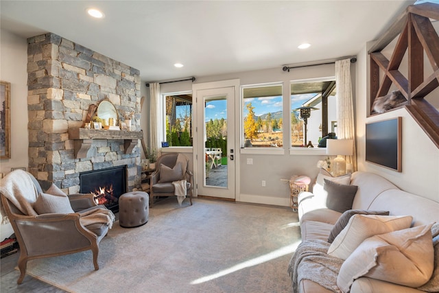 736 Cottonwood Ct, Whitefish, MT 59937 - living room featuring plenty of natural light, carpet floors, a stone fireplace, and recessed lighting