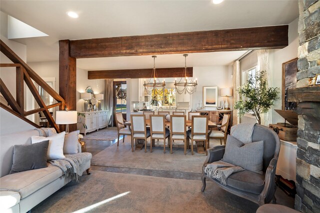 736 Cottonwood Ct, Whitefish, MT 59937 - living area featuring a chandelier, beamed ceiling, stairway, and recessed lighting