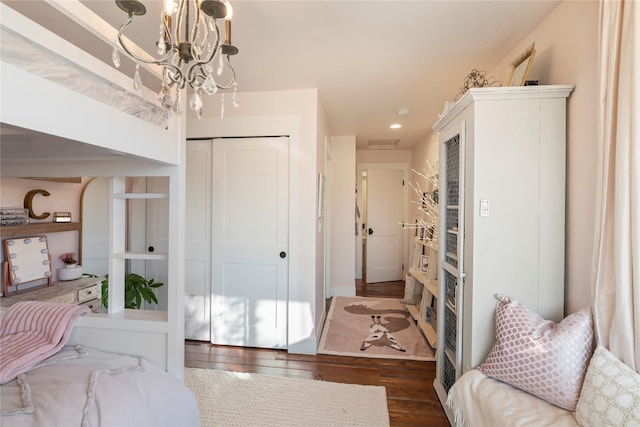 736 Cottonwood Ct, Whitefish, MT 59937 - bedroom featuring wood finished floors, a closet, a chandelier, and recessed lighting