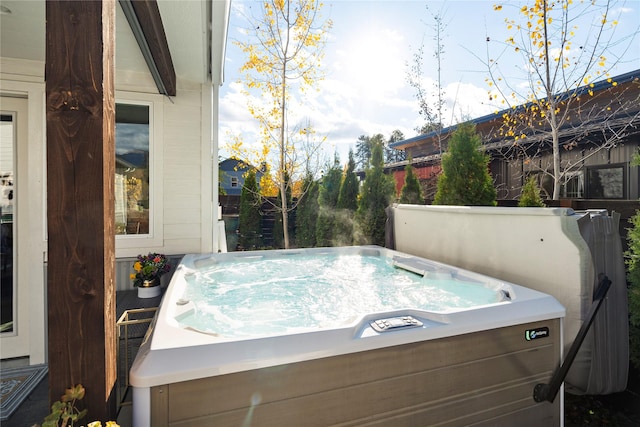 736 Cottonwood Ct, Whitefish, MT 59937 - view of patio with a hot tub