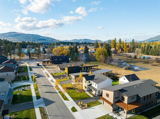 736 Cottonwood Ct, Whitefish, MT 59937 - aerial perspective of suburban area featuring a mountain backdrop