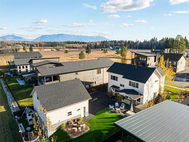 736 Cottonwood Ct, Whitefish, MT 59937 - aerial view of residential area with mountains