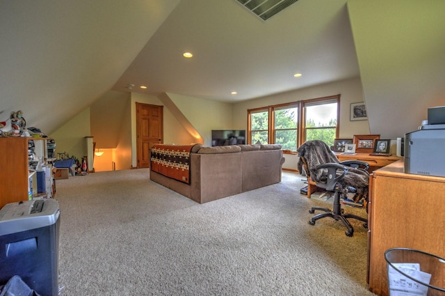 carpeted office space featuring visible vents, recessed lighting, and vaulted ceiling