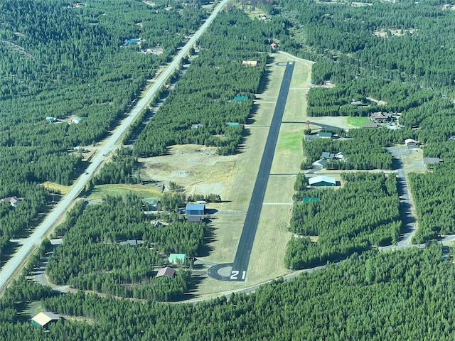 bird's eye view featuring a forest view