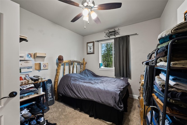 bedroom with carpet floors, ceiling fan, and lofted ceiling