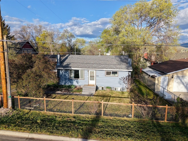 2060 Schilling St, Missoula, MT 59801 - view of front of home with a fenced front yard and a chimney